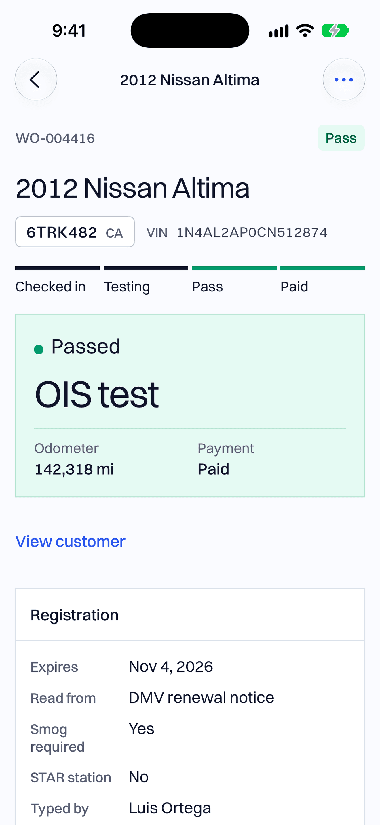 A work order for a 2012 Nissan Altima: checked in, testing, pass, paid.