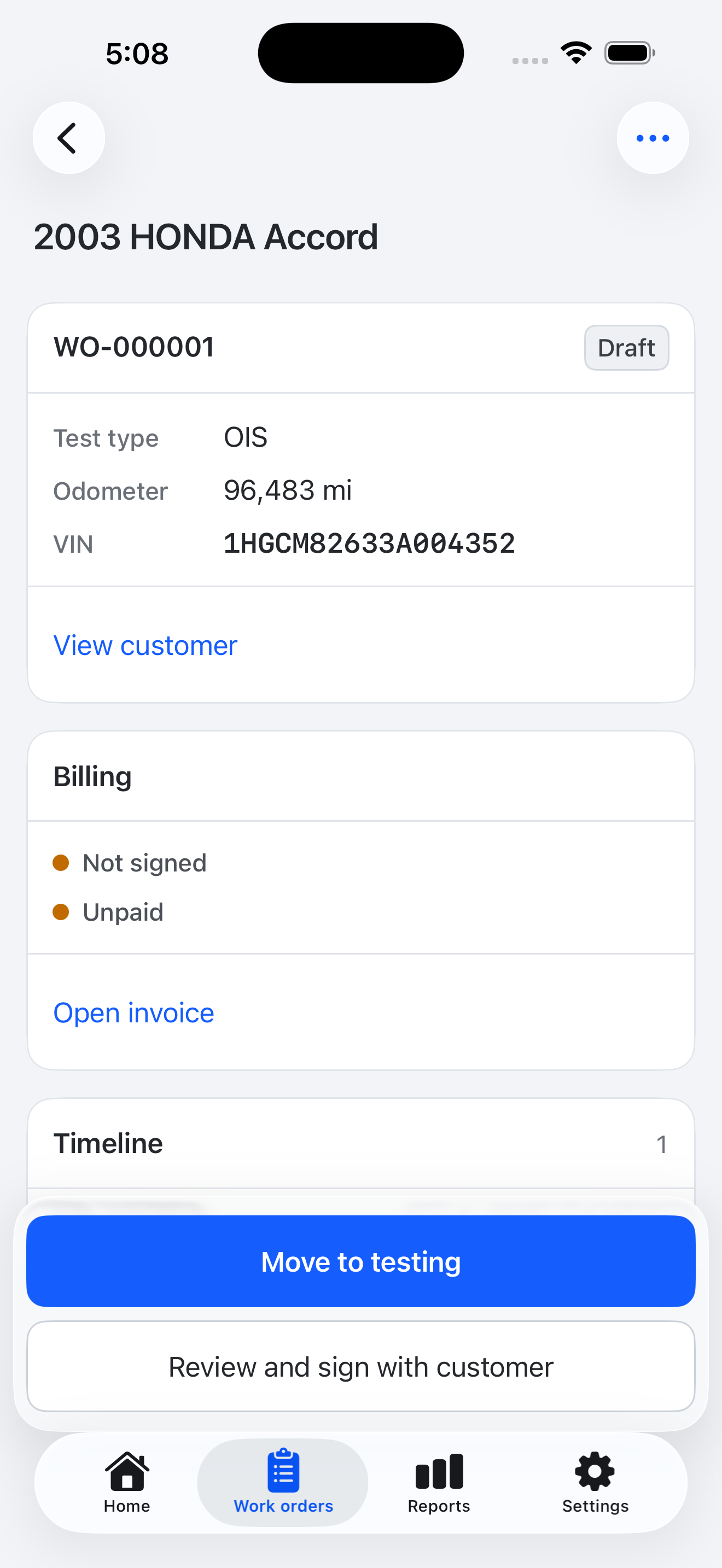 Actual iPhone work-order screen with demo vehicle details and billing status